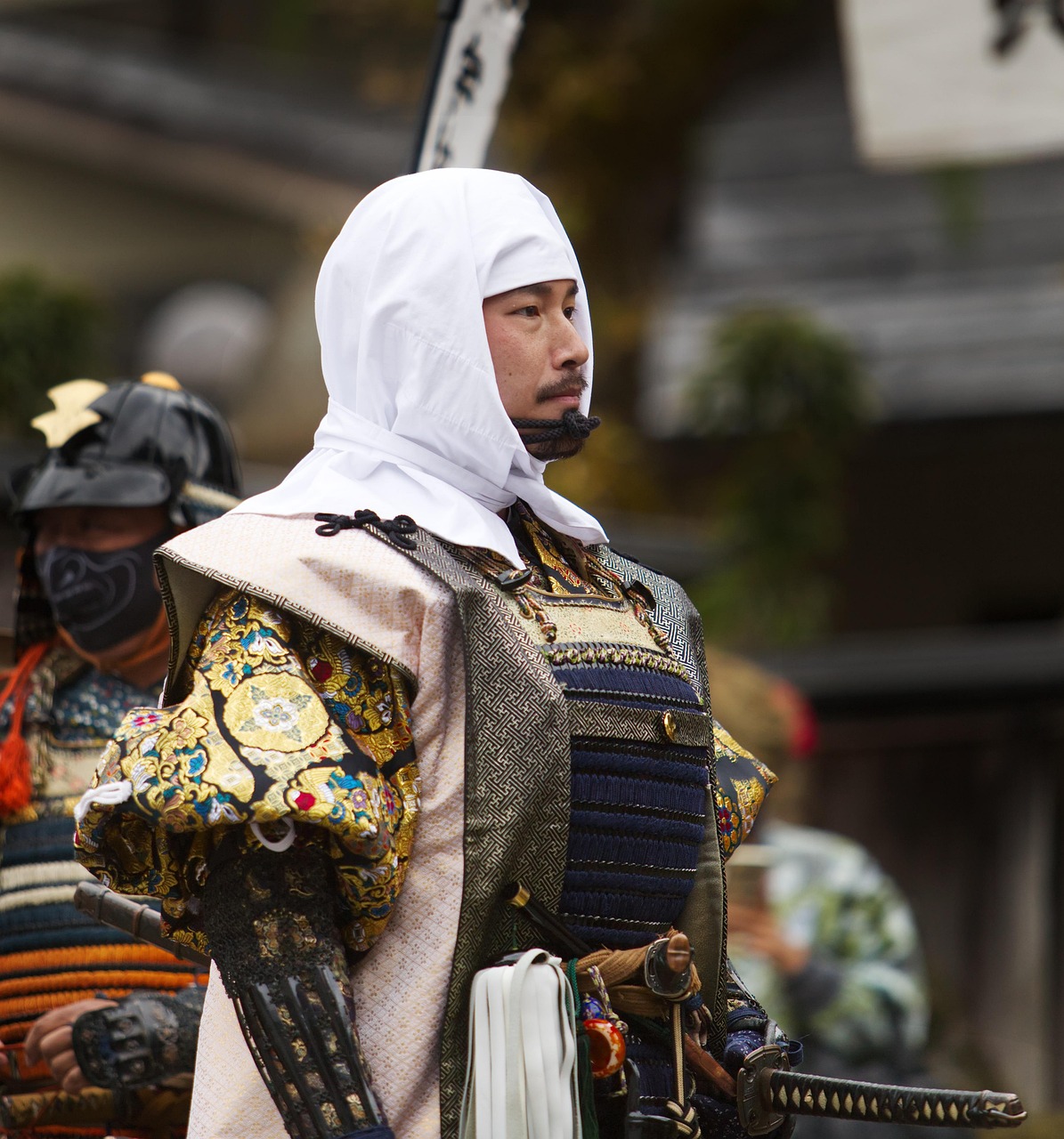 Festival parade with traditional Japanese attire and lanterns